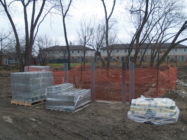 concrete block and cement arrive for garbage containment area