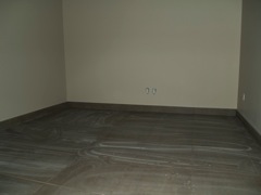 grouting and tile baseboard in server room